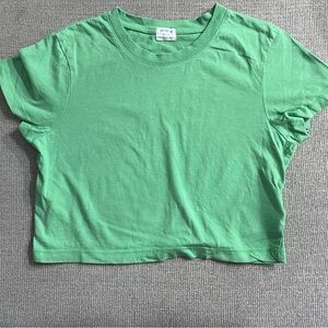 Cotton on green shirt.